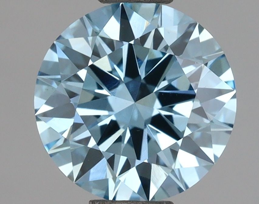 Ideal Loose Diamond - ROUND 1.48ct Fancy Vivid Blue VS1: Ideal Loose Diamond - ROUND 1.48ct Fancy Vivid Blue VS1 Source: This is a real non-mined Diamond that has been grown in a lab Shape: ROUND Carats: 1.48 Color: Fancy Vivid Blue Certification: IGI Video