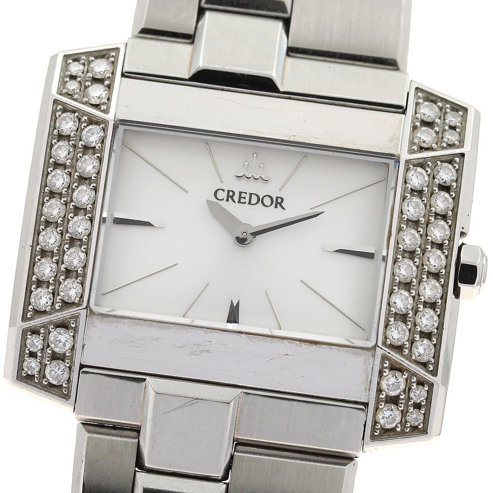 Seiko Credor Node Ladies Quartz Stainless Steel Wristwatch GSTE921 1E70-0BL0: Seiko Credor Node Ladies Quartz Stainless Steel Wristwatch GSTE921 1E70-0BL0 This Seiko Credor Node women's wristwatch features a stainless steel case and bracelet with a classic white dial. The quart