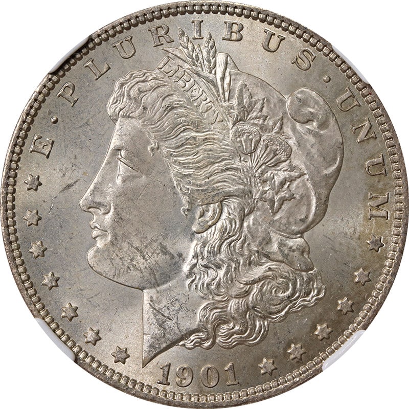 NGC MS63 1901-O Silver Morgan Dollar with Subtle Toning: NGC MS63 1901-O Silver Morgan Dollar with Subtle Toning This 1901-O Morgan Silver Dollar is certified by NGC with a grade of MS63. The coin is composed of silver with a fineness of 0.9 and features li