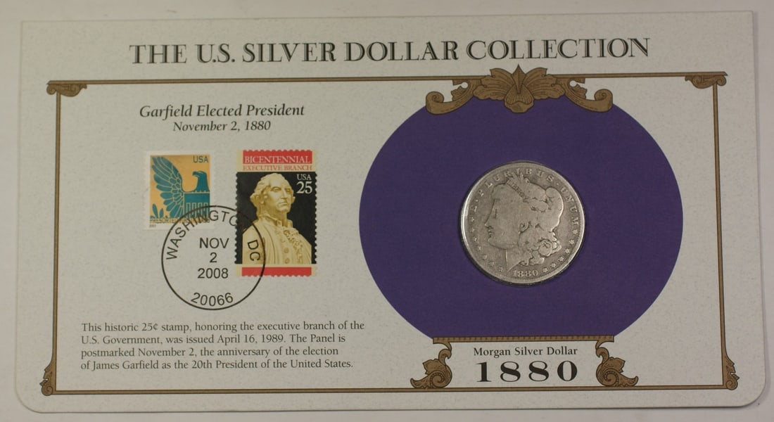 1880 Morgan Dollar in PCS Holder with 2 Stamps: 1880 Morgan Dollar in PCS Holder with 2 Stamps This item is an 1880 Morgan Silver Dollar $1 coin from the United States, composed of silver and minted in Philadelphia. The coin is circulated and comes