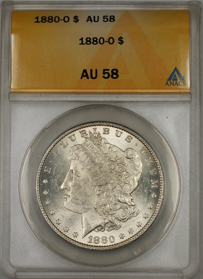 ANACS AU-58 Graded 1880-O Morgan Silver Dollar from New Orleans Mint: ANACS AU-58 Graded 1880-O Morgan Silver Dollar from New Orleans Mint This 1880-O Morgan Silver Dollar is certified by ANACS with an AU-58 grade, indicating it is an attractive circulated coin. Minted 