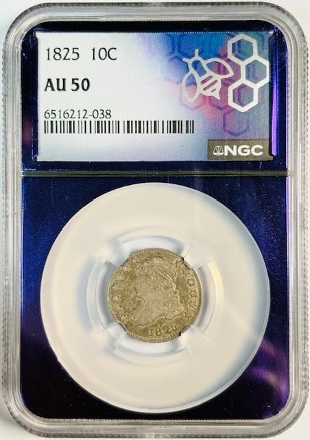 NGC Certified 1825 Silver Dime AU 50 Grade: NGC Certified 1825 Silver Dime AU 50 Grade This 1825 Capped Bust Dime is graded AU 50 by NGC and features a silver composition. As a circulated, pre-owned coin from the United States, it showcases his