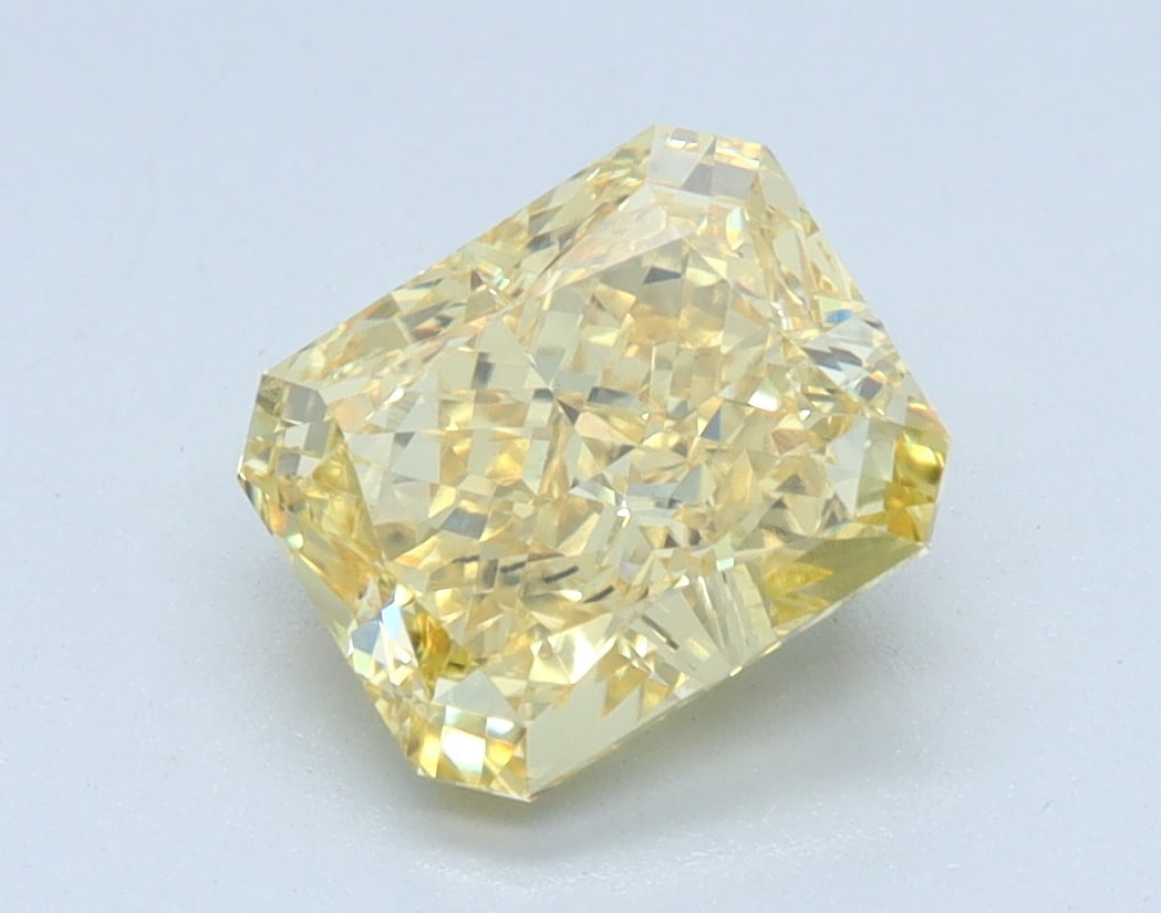 Loose Diamond - RADIANT 1.59ct YELLOW VS1: Loose Diamond - RADIANT 1.59ct YELLOW VS1 Source: This is a real non-mined Diamond that has been grown in a lab Shape: RADIANT Carats: 1.59 Color: YELLOW Clarity: VS1 Certification: IGI Condition: Pre