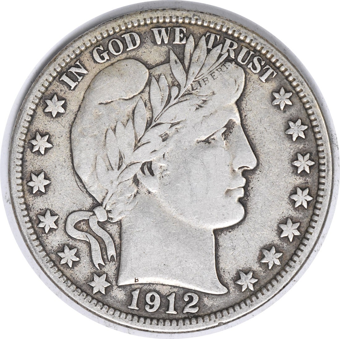 1912-D Barber Silver Half Dollar 50C VF Uncertified Denver Mint Coin: 1912-D Barber Silver Half Dollar 50C VF Uncertified Denver Mint Coin This 1912-D Barber Silver Half Dollar is a classic piece of American numismatics. Featuring a design by Charles E. Barber, this coi