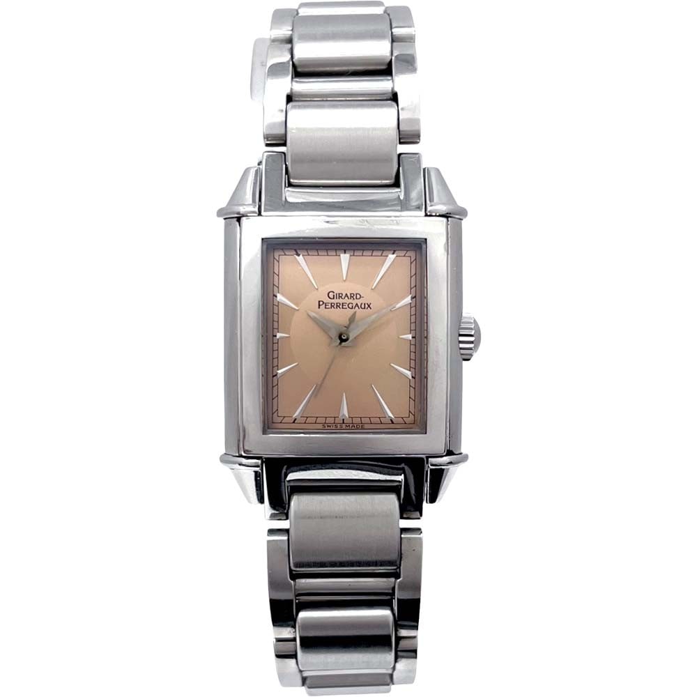 Girard Perregaux Vintage 1945 Ladies Stainless Steel Wristwatch 2590: Girard Perregaux Vintage 1945 Ladies Stainless Steel Wristwatch 2590 This Girard-Perregaux Vintage 1945 ladies' wristwatch features a rectangular stainless steel case with a pink dial and three-hand d