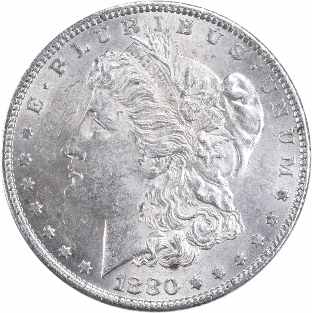 Uncirculated 1880-O Morgan Dollar Silver Coin Brilliant Uncertified: Uncirculated 1880-O Morgan Dollar Silver Coin Brilliant Uncertified This is an 1880-O Morgan Silver Dollar from the United States, featuring a brilliant uncirculated (BU) grade. The coin is composed o