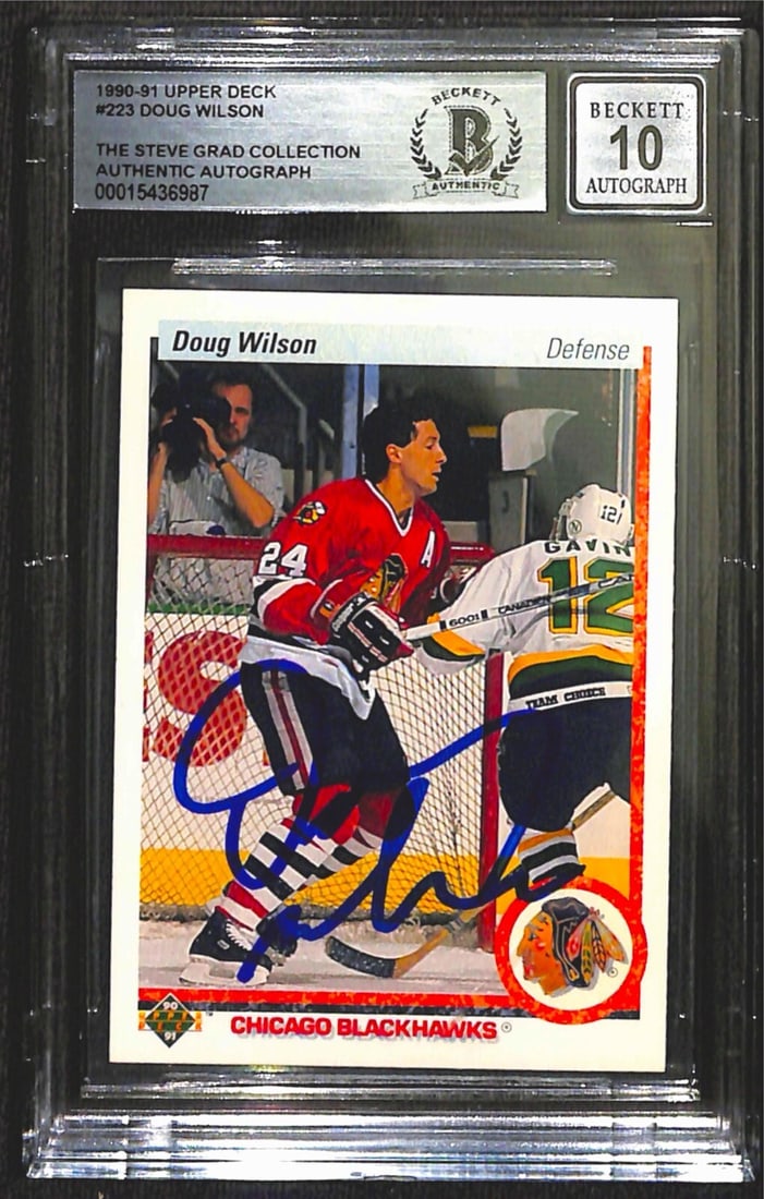 Doug Wilson Signed 1990-91 Upper Deck Card Auto 10 Beckett: Doug Wilson Signed 1990-91 Upper Deck Card Auto 10 Beckett This is a signed sports trading card featuring Doug Wilson, a former left wing for the Chicago Blackhawks. The card is from the 1990-91 Upper