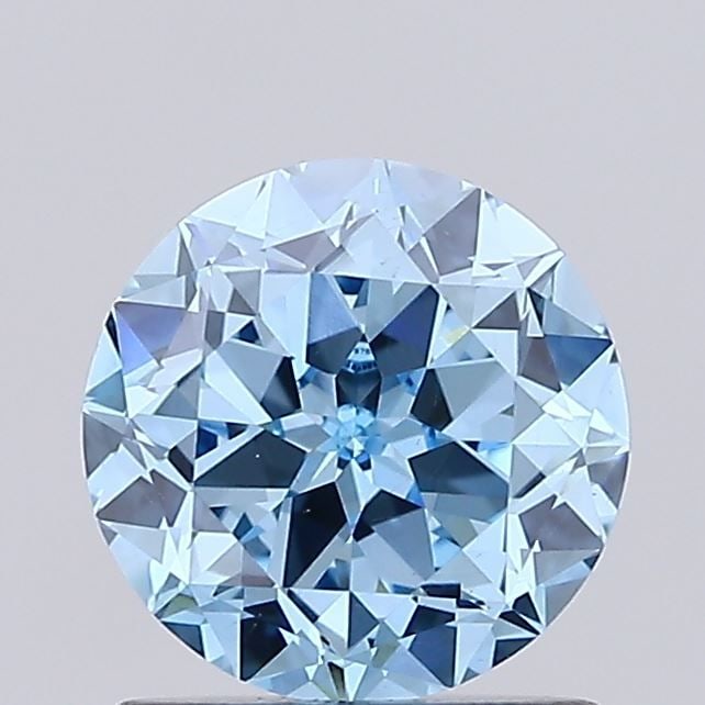 Loose Diamond - ROUND 1.07ct Fancy Vivid Blue VS2: Loose Diamond - ROUND 1.07ct Fancy Vivid Blue VS2 Source: This is a real non-mined Diamond that has been grown in a lab Shape: ROUND Carats: 1.07 Color: Fancy Vivid Blue Certification: IGI Video:
