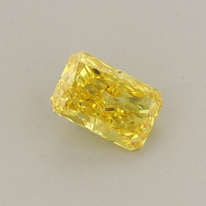 Loose Diamond - RADIANT 0.33ct Fancy Vivid Yellow VS1: Loose Diamond - RADIANT 0.33ct Fancy Vivid Yellow VS1 Source: This is a real non-mined Diamond that has been grown in a lab Shape: RADIANT Carats: 0.33 Color: Fancy Vivid Yellow Certification: IGI Vid