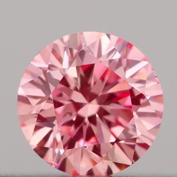 Loose Diamond - ROUND 0.18ct Fancy Vivid Pink VS2: Loose Diamond - ROUND 0.18ct Fancy Vivid Pink VS2 Source: This is a real non-mined Diamond that has been grown in a lab Shape: ROUND Carats: 0.18 Color: Fancy Vivid Pink Certification: IGI Video: