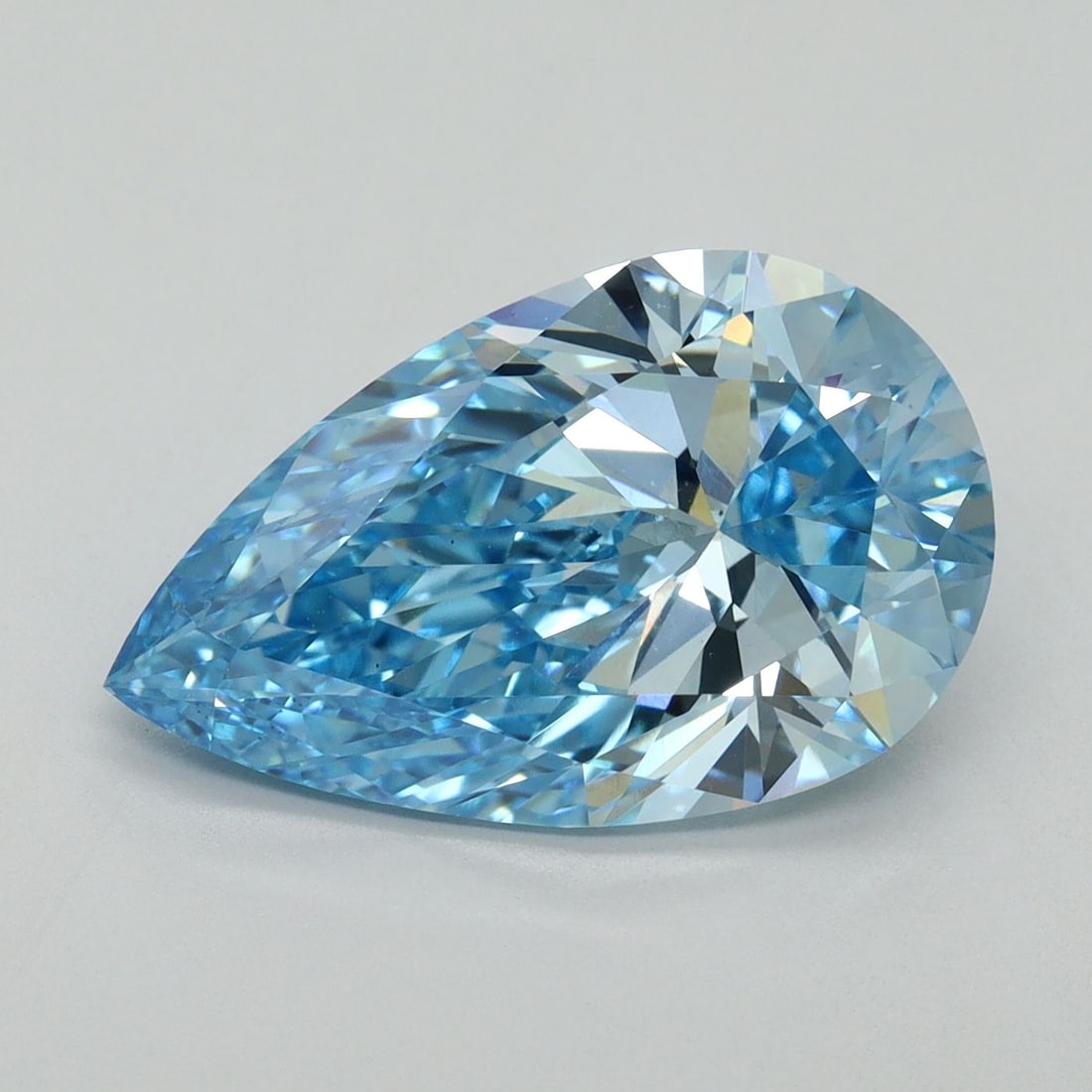 Loose Diamond - PEAR 5.06ct Fancy Vivid Blue VS1: Loose Diamond - PEAR 5.06ct Fancy Vivid Blue VS1 Source: This is a real non-mined Diamond that has been grown in a lab Shape: PEAR Carats: 5.06 Color: Fancy Vivid Blue Certification: IGI Video: