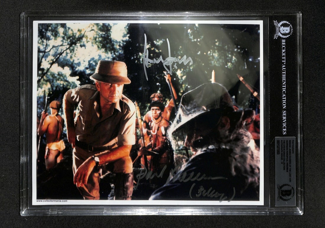 Beckett 10 slabbed 8x10 Raiders of the Lost Ark signed photo: Beckett 10 slabbed 8x10 Raiders of the Lost Ark signed photo This is an original 8x10 color photograph autographed by Harrison Ford as Indiana Jones and Paul Freeman as Rene Belloq from the movie Raid