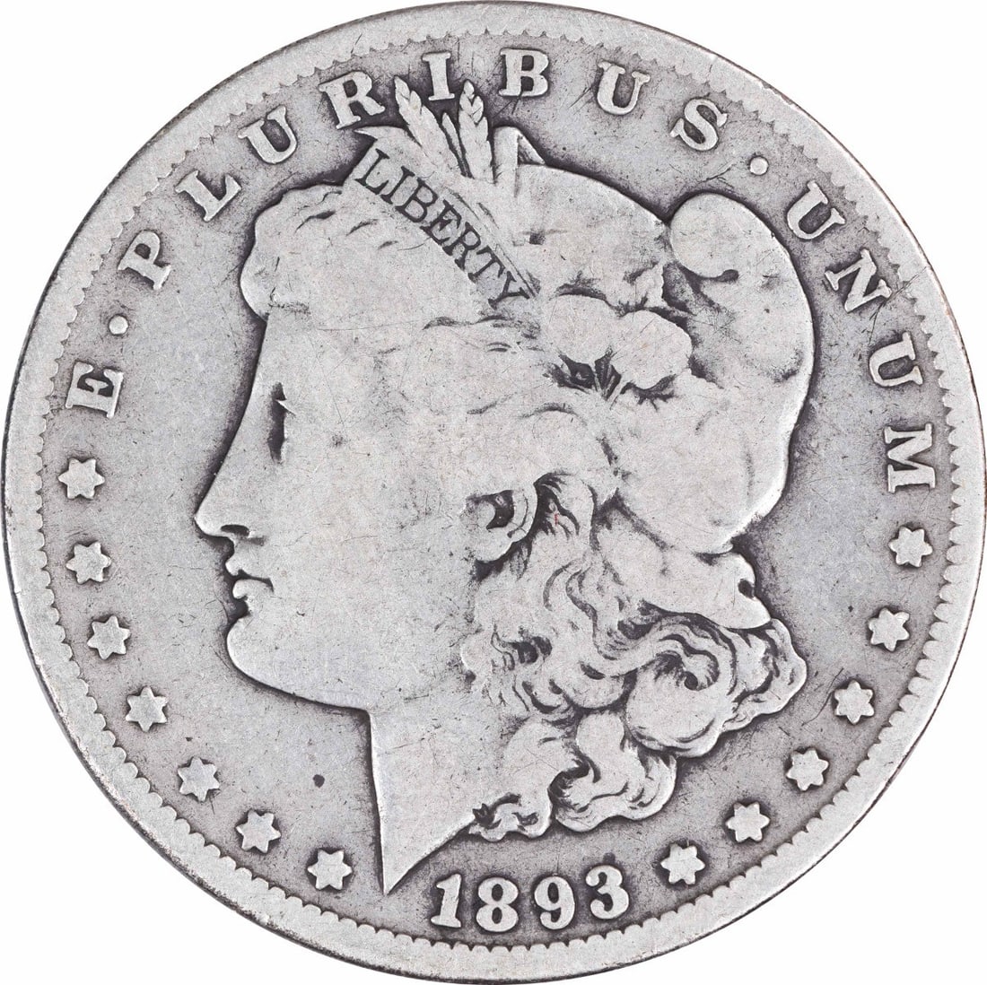 1893-CC Morgan Silver Dollar VG Uncertified 90% Silver Coin: 1893-CC Morgan Silver Dollar VG Uncertified 90% Silver Coin This 1893-CC Morgan Silver Dollar is a historical coin that showcases the artistry of designer George T. Morgan. Struck at the Carson City M