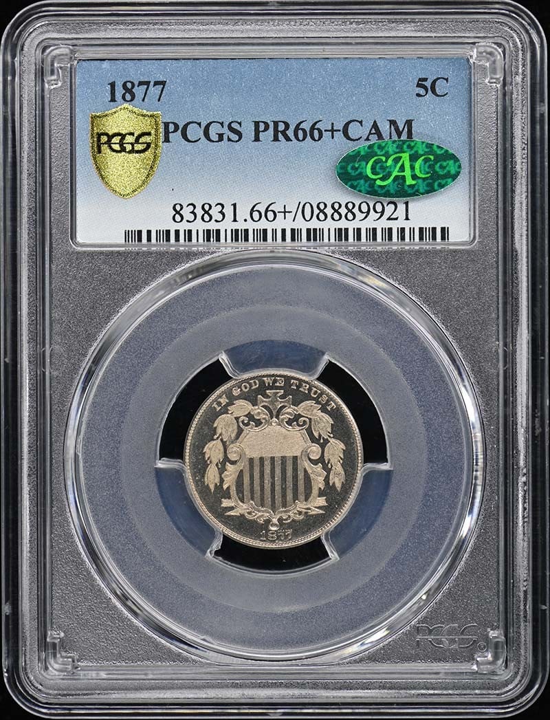 1877 5C Shield Nickel PCGS PR66+CAM CAC Certified: 1877 5C Shield Nickel PCGS PR66+CAM CAC Certified This 1877 Shield Nickel is a stunning example of numismatic craftsmanship, certified by PCGS with a grade of PR66+ and a Cameo designation. Struck in 