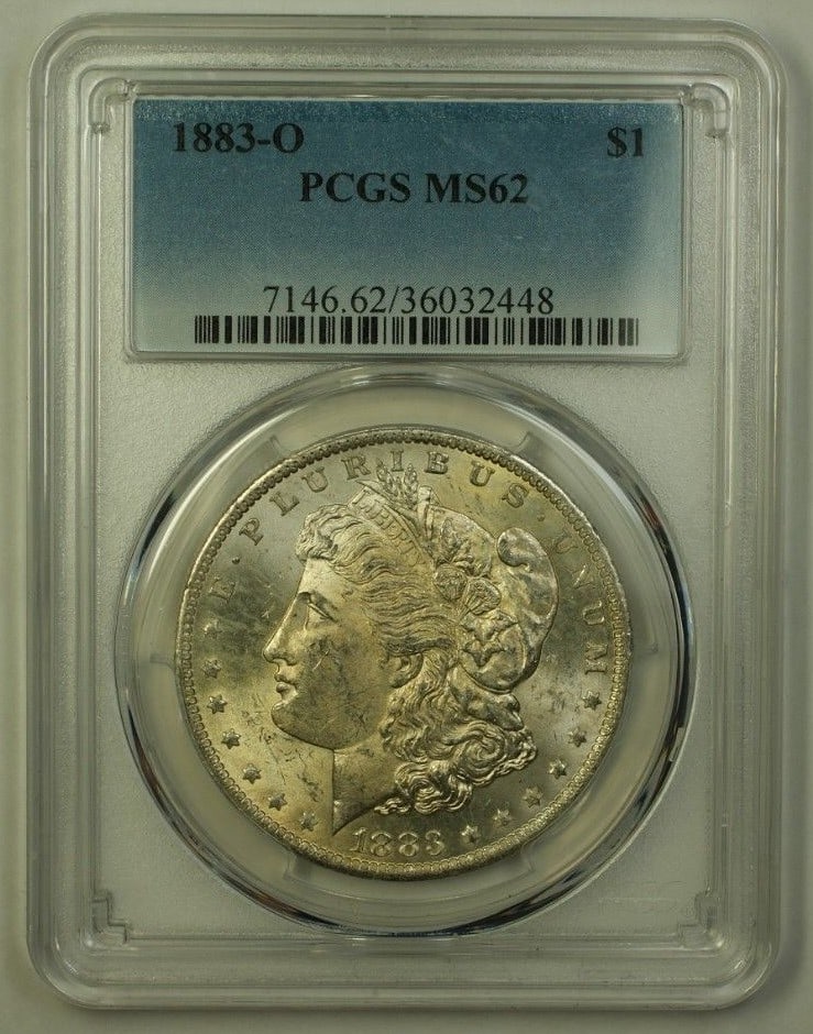 PCGS MS62 1883-O Morgan Silver Dollar: PCGS MS62 1883-O Morgan Silver Dollar This is an 1883-O Morgan Silver Dollar with a denomination of $1, minted in New Orleans. The coin is composed of silver and has been graded MS-62 by PCGS, indicat
