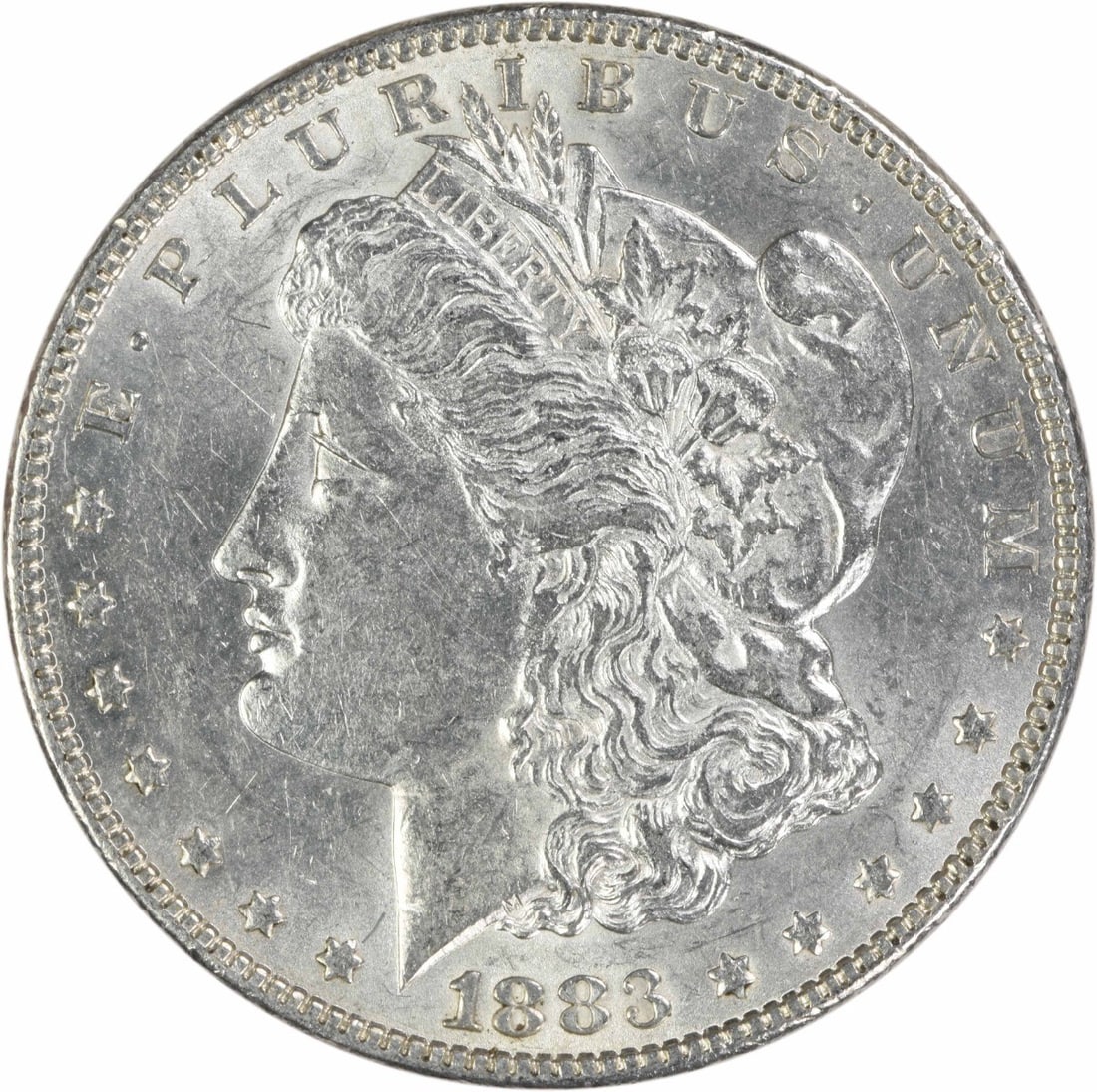 1883 Philadelphia Morgan Dollar AU Uncertified: 1883 Philadelphia Morgan Dollar AU Uncertified This 1883 Morgan Silver Dollar is an attractive example of the classic U.S. coin, designed by George T. Morgan. Struck in Philadelphia with no mint mark,