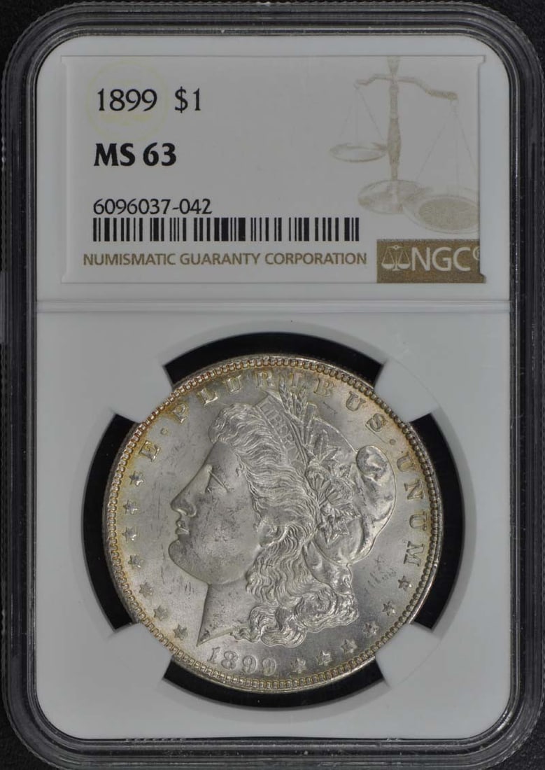 1899 Morgan Dollar NGC MS63 Uncirculated Philadelphia Coin: 1899 Morgan Dollar NGC MS63 Uncirculated Philadelphia Coin This 1899 Morgan Dollar is a stunning example of American numismatic history, certified by NGC with a grade of MS63. Struck in Philadelphia, 