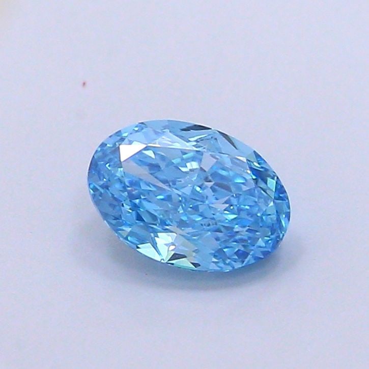 Loose Diamond - OVAL 1.01ct Fancy Vivid Blue VVS1: Loose Diamond - OVAL 1.01ct Fancy Vivid Blue VVS1 Source: This is a real non-mined Diamond that has been grown in a lab Shape: OVAL Carats: 1.01 Color: Fancy Vivid Blue Certification: IGI Video: