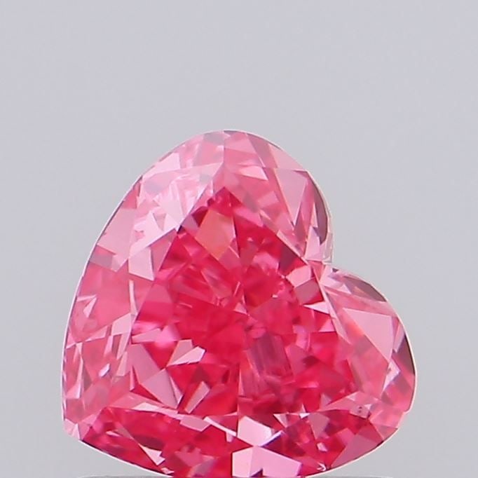 Loose Diamond - HEART 0.79ct Fancy Vivid Pink VVS2: Loose Diamond - HEART 0.79ct Fancy Vivid Pink VVS2 Source: This is a real non-mined Diamond that has been grown in a lab Shape: HEART Carats: 0.79 Color: Fancy Vivid Pink Certification: IGI Video: