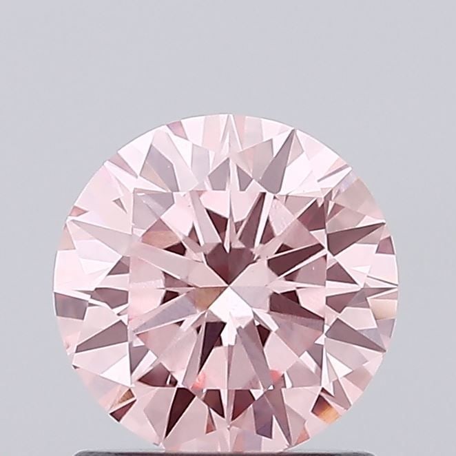 Loose Diamond - ROUND 1.09ct Fancy Vivid Pink VVS2: Loose Diamond - ROUND 1.09ct Fancy Vivid Pink VVS2 Source: This is a real non-mined Diamond that has been grown in a lab Shape: ROUND Carats: 1.09 Color: Fancy Vivid Pink Certification: IGI Video: