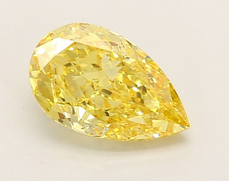 Loose Diamond - PEAR 1.46ct Fancy Vivid Yellow VS2: Loose Diamond - PEAR 1.46ct Fancy Vivid Yellow VS2 Source: This is a real non-mined Diamond that has been grown in a lab Shape: PEAR Carats: 1.46 Color: Fancy Vivid Yellow Certification: IGI Video: