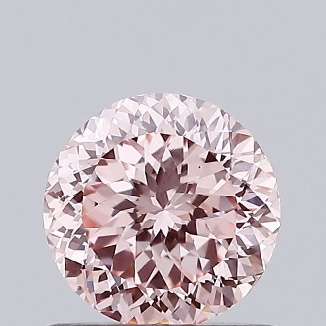 Loose Diamond - ROUND 0.76ct Fancy Intense Pink VS1: Loose Diamond - ROUND 0.76ct Fancy Intense Pink VS1 Source: This is a real non-mined Diamond that has been grown in a lab Shape: ROUND Carats: 0.76 Color: Fancy Intense Pink Certification: IGI Video: