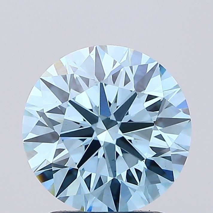 Ideal Loose Diamond - ROUND 1.79ct Fancy Vivid Blue VS1: Ideal Loose Diamond - ROUND 1.79ct Fancy Vivid Blue VS1 Source: This is a real non-mined Diamond that has been grown in a lab Shape: ROUND Carats: 1.79 Color: Fancy Vivid Blue Certification: IGI Video