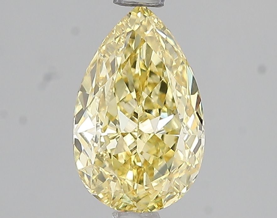 Loose Diamond - PEAR 1.51ct Fancy Intense Yellow VS1: Loose Diamond - PEAR 1.51ct Fancy Intense Yellow VS1 Source: This is a real non-mined Diamond that has been grown in a lab Shape: PEAR Carats: 1.51 Color: Fancy Intense Yellow Certification: IGI Video