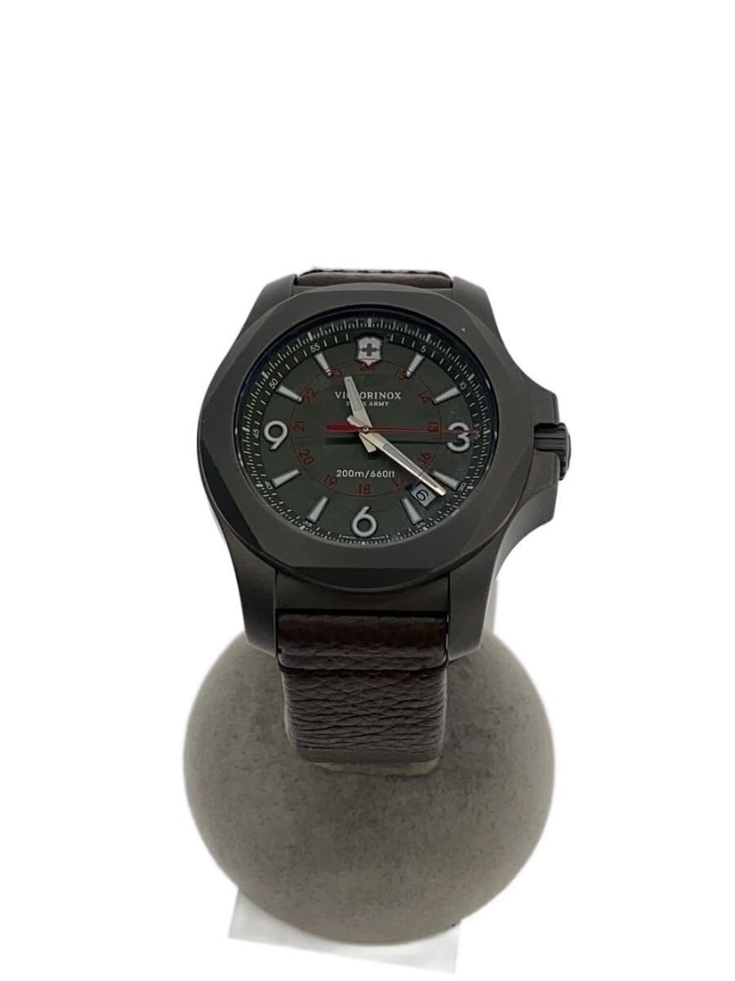 Victorinox I.N.O.X Titanium Quartz Men's Wristwatch: Victorinox I.N.O.X Titanium Quartz Men's Wristwatch This Victorinox I.N.O.X Titanium Quartz 241779 men's wristwatch features a khaki leather strap and a titanium case. The watch is pre-owned and shows