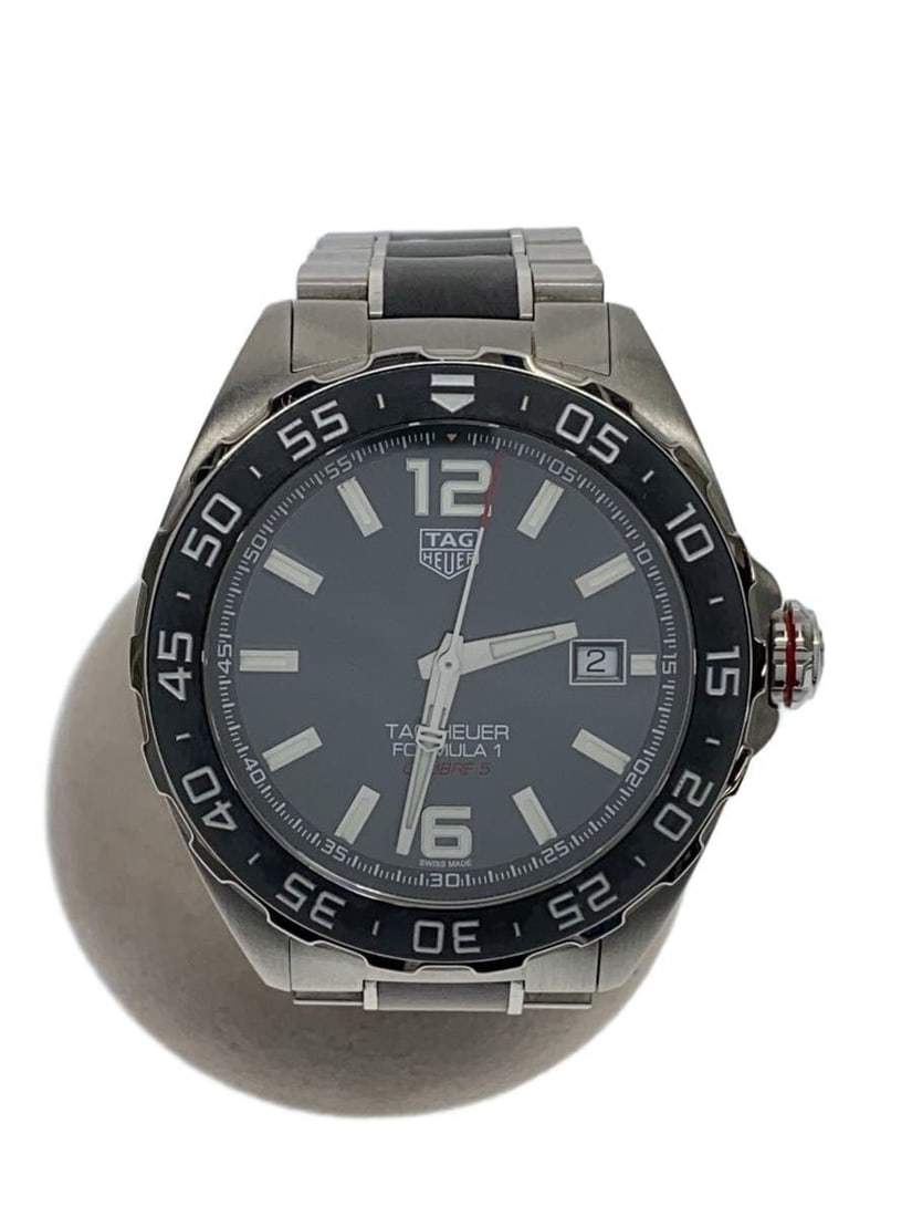 TAG Heuer Formula 1 Caliber 5 Stainless Steel Men's Wristwatch: TAG Heuer Formula 1 Caliber 5 Stainless Steel Men's Wristwatch This TAG Heuer Formula 1 Caliber 5 WAZ2011.BA0843 men's wristwatch is crafted from stainless steel and features a black dial. Designed fo