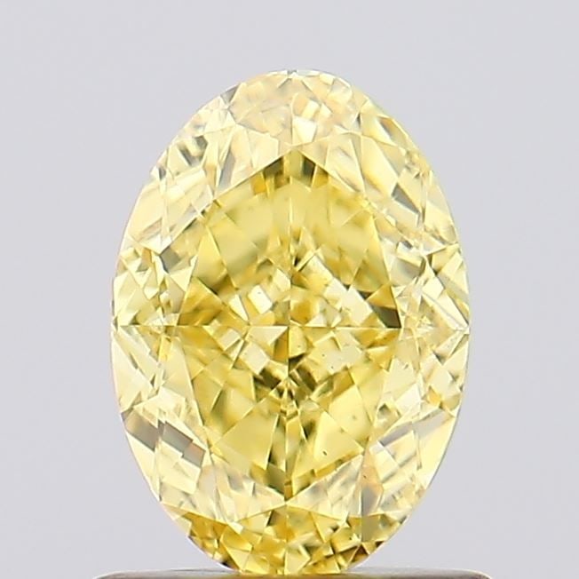 Loose Diamond - OVAL 1.02ct Fancy Vivid Yellow VS1: Loose Diamond - OVAL 1.02ct Fancy Vivid Yellow VS1 Source: This is a real non-mined Diamond that has been grown in a lab Shape: OVAL Carats: 1.02 Color: Fancy Vivid Yellow Certification: IGI Video: