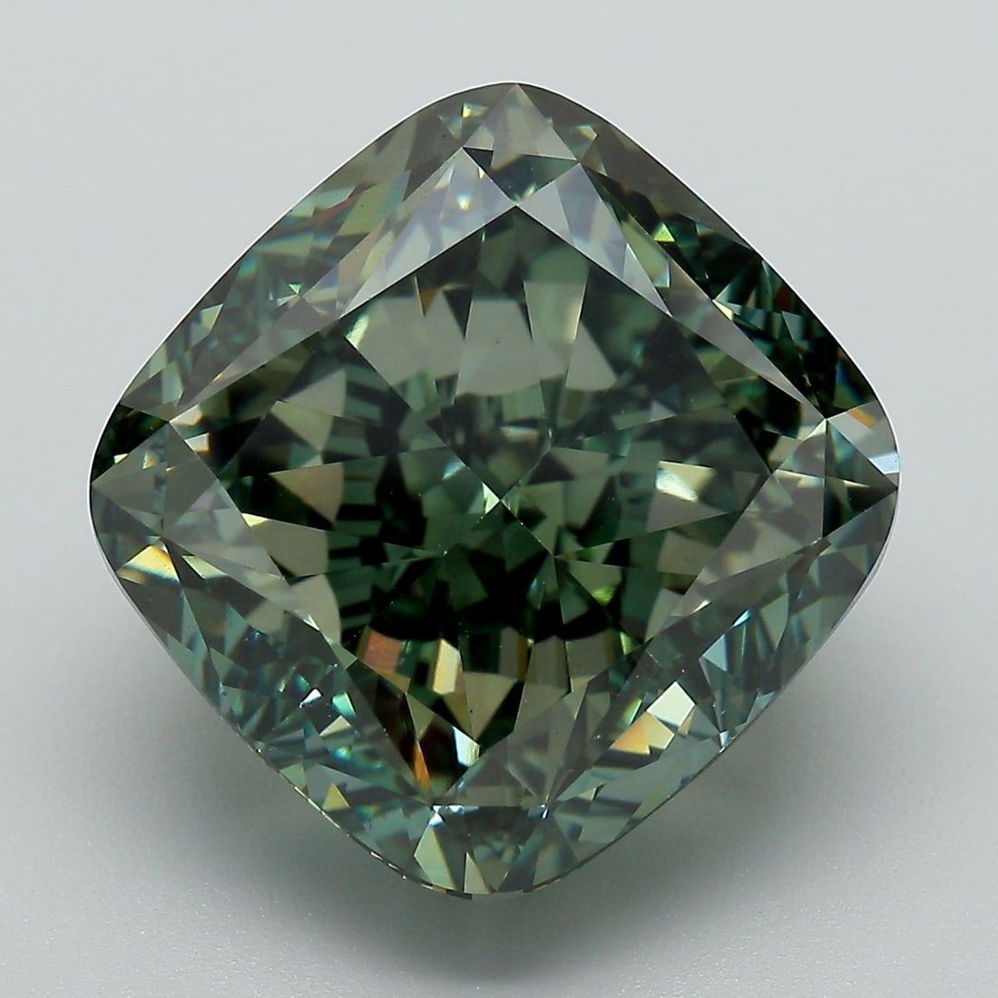 Loose Diamond - CUSHION MODIFIED 15.61ct Fancy Vivid Green VS1: Loose Diamond - CUSHION MODIFIED 15.61ct Fancy Vivid Green VS1 Source: This is a real non-mined Diamond that has been grown in a lab Shape: CUSHION MODIFIED Carats: 15.61 Color: Fancy Vivid Green Cert