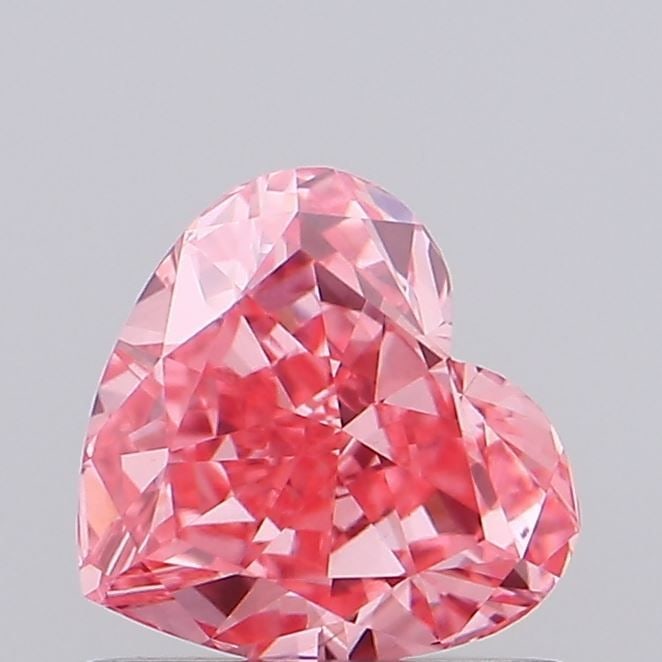 Loose Diamond - HEART 0.81ct Fancy Vivid Pink VVS2: Loose Diamond - HEART 0.81ct Fancy Vivid Pink VVS2 Source: This is a real non-mined Diamond that has been grown in a lab Shape: HEART Carats: 0.81 Color: Fancy Vivid Pink Certification: IGI Video: