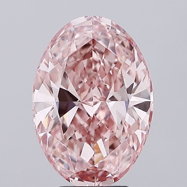 Loose Diamond - OVAL 4.55ct Fancy Vivid Pink VS2: Loose Diamond - OVAL 4.55ct Fancy Vivid Pink VS2 Source: This is a real non-mined Diamond that has been grown in a lab Shape: OVAL Carats: 4.55 Color: Fancy Vivid Pink Certification: IGI Video: Video