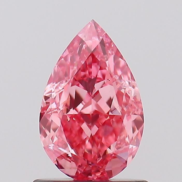 Loose Diamond - PEAR 1.01ct Fancy Vivid Pink VS1: Loose Diamond - PEAR 1.01ct Fancy Vivid Pink VS1 Source: This is a real non-mined Diamond that has been grown in a lab Shape: PEAR Carats: 1.01 Color: Fancy Vivid Pink Certification: IGI Video: