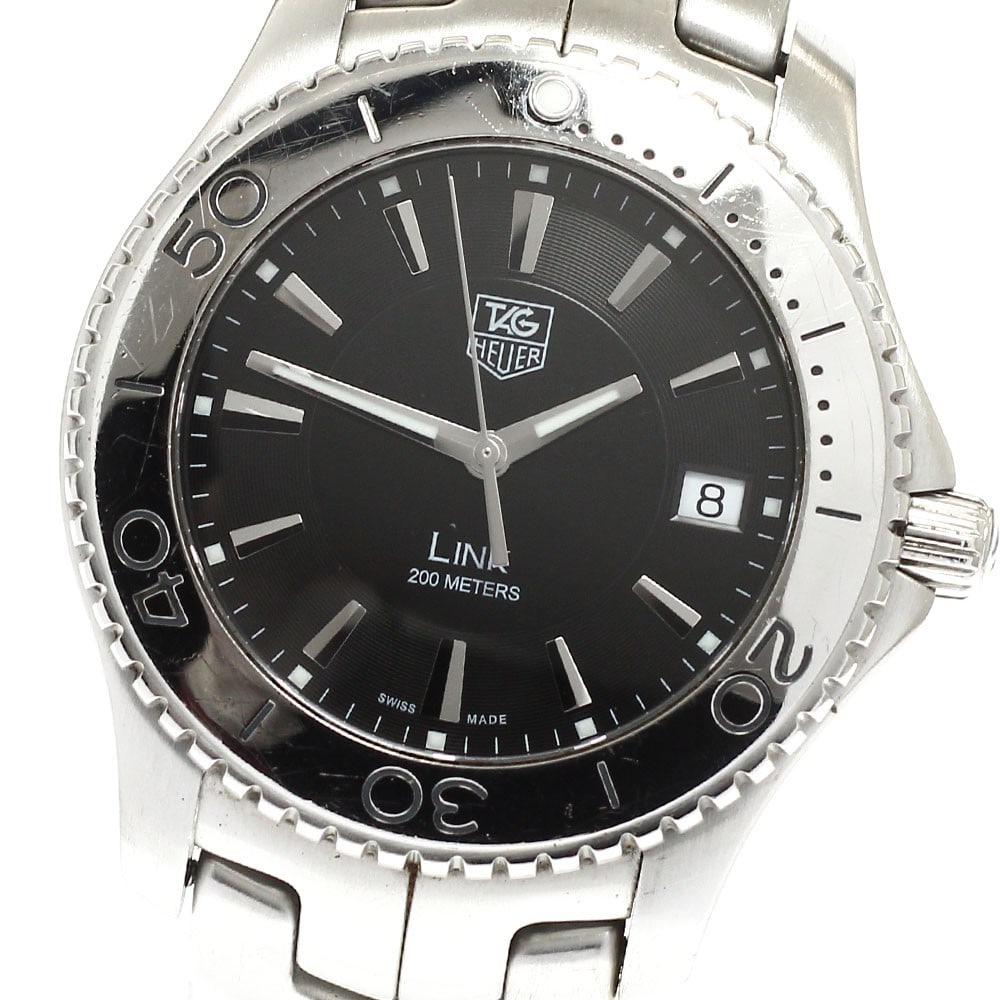 TAG Heuer Link Quartz Date Stainless Steel Men's Watch: TAG Heuer Link Quartz Date Stainless Steel Men's Watch This TAG Heuer Link Date Quartz men's wristwatch, model WJ1110.BA0570, features a stainless steel case and bracelet with a black dial. The watch 