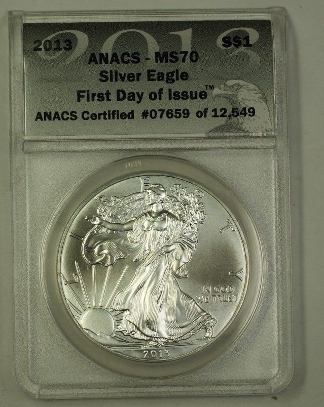 ANACS MS-70 2013 American Silver Eagle $1 First Day of Issue: ANACS MS-70 2013 American Silver Eagle $1 First Day of Issue This 2013 US American Silver Eagle $1 coin contains 1 troy ounce of silver and is graded MS-70 by ANACS, indicating a flawless condition. I