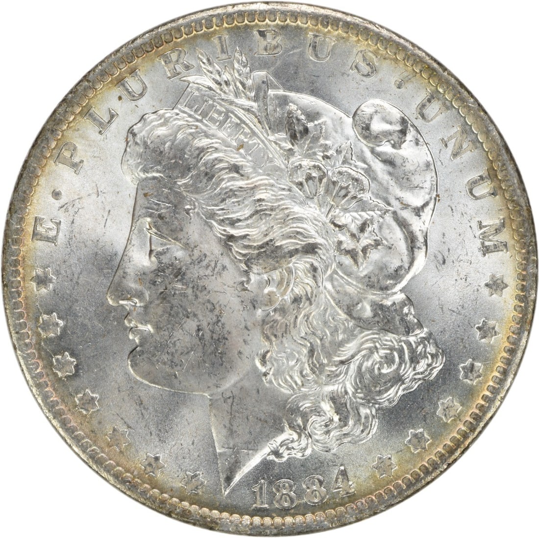 Uncirculated 1884-O Silver Dollar Morgan Type Uncertified US Coin: Uncirculated 1884-O Silver Dollar Morgan Type Uncertified US Coin This is an 1884-O Morgan Silver Dollar from the United States, featuring brilliant uncirculated (BU) condition. The coin is composed o