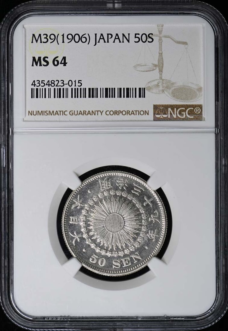 Japan 1906 50 Sen Silver Coin NGC MS64: Japan 1906 50 Sen Silver Coin NGC MS64 This is a 1906 Japan 50 sen coin, certified by NGC with a grade of MS64. The coin is uncirculated and originates from Japan. It is in pre-owned condition. Specif