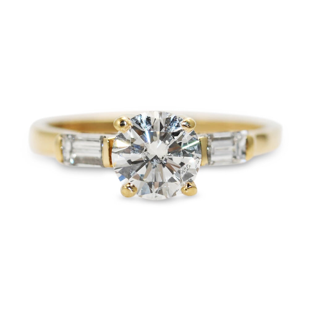 14k Yellow Gold Size 7 Diamond Engagement Ring 1.03 ct: 14k Yellow Gold Size 7 Diamond Engagement Ring 1.03 ct This pre-owned engagement ring features a natural diamond set in 14K yellow gold. The diamond weighs between 1.00 and 1.24 carats, with a clarity