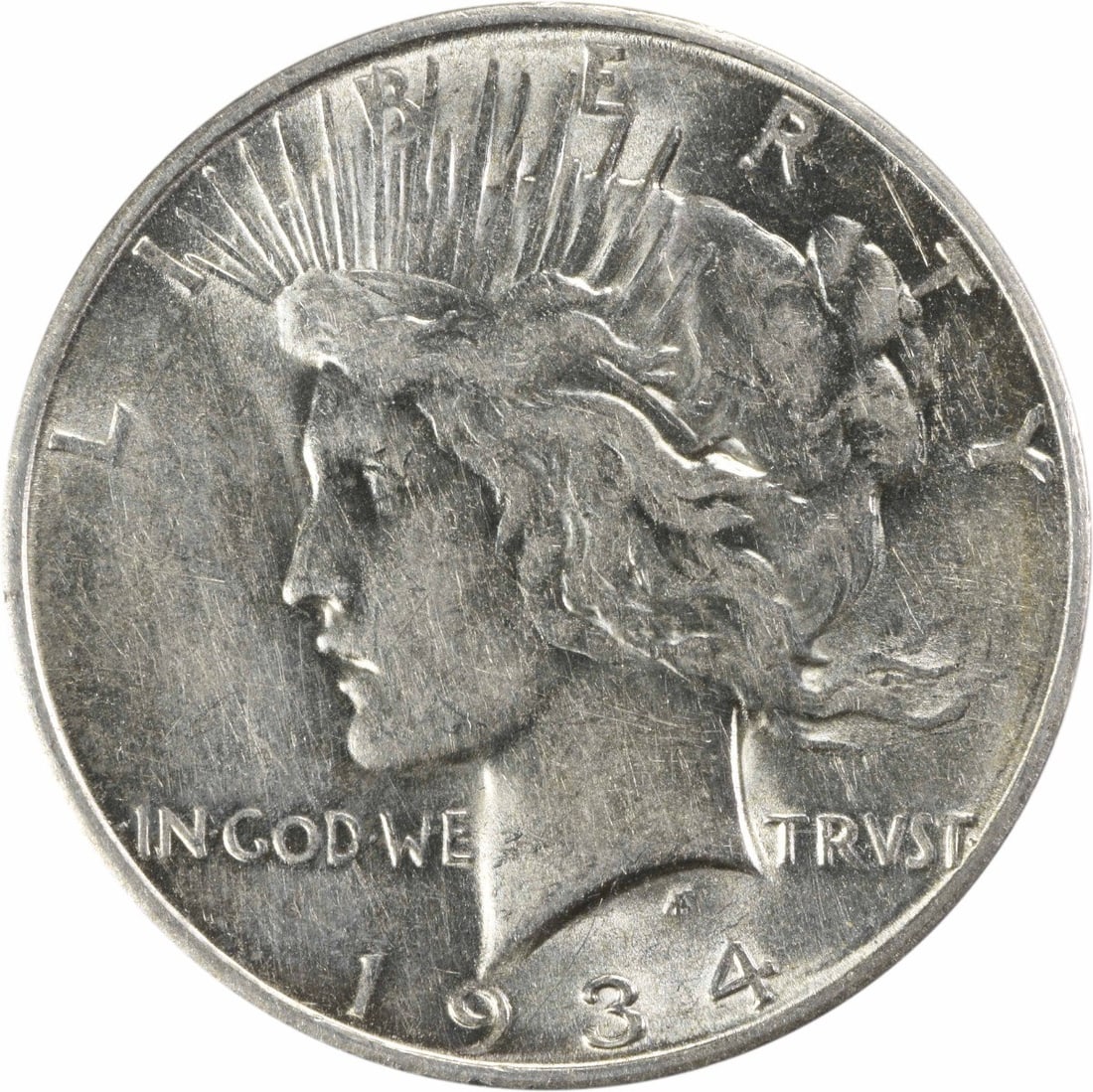 1934-D Peace Silver Dollar AU Uncertified by Anthony de Francisci: 1934-D Peace Silver Dollar AU Uncertified by Anthony de Francisci This 1934-D Peace Silver Dollar is a remarkable coin for collectors, showcasing a beautiful design by Anthony de Francisci. The coin h