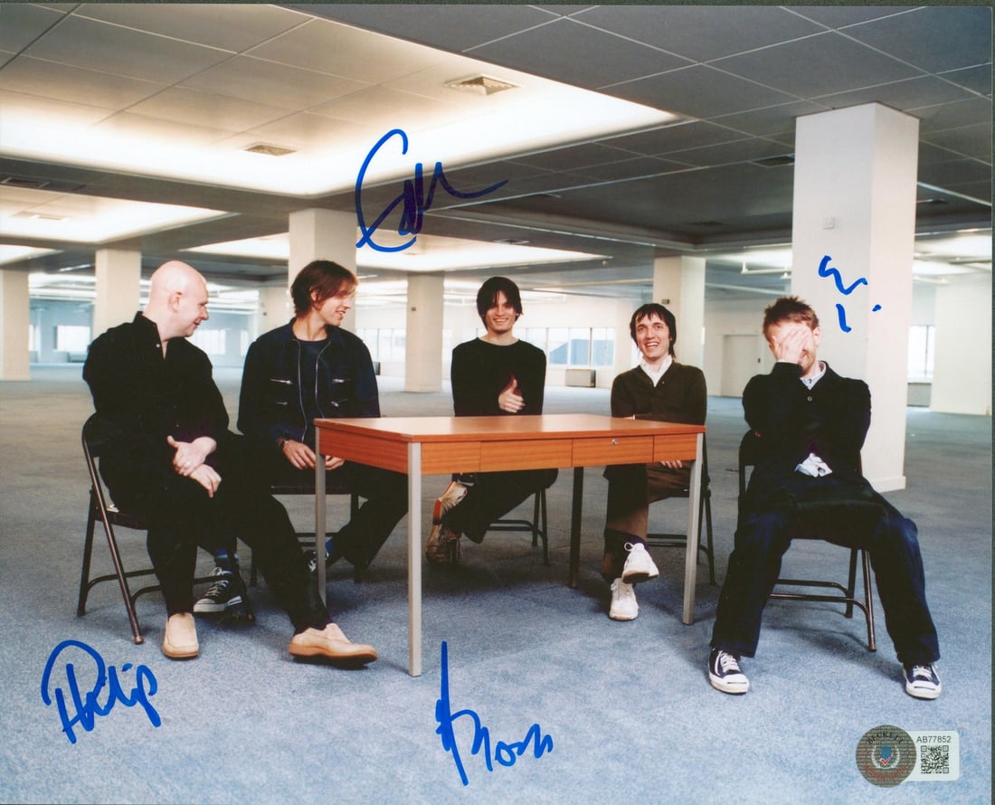 Radiohead Signed 8x10 Photo by Yorke O'Brien Greenwood Selway BAS #AB77852: Radiohead Signed 8x10 Photo by Yorke O'Brien Greenwood Selway BAS #AB77852 This 8x10 photo features the autographs of Thom Yorke, Ed O'Brien, Colin Greenwood, and Philip Selway, members of the iconic 
