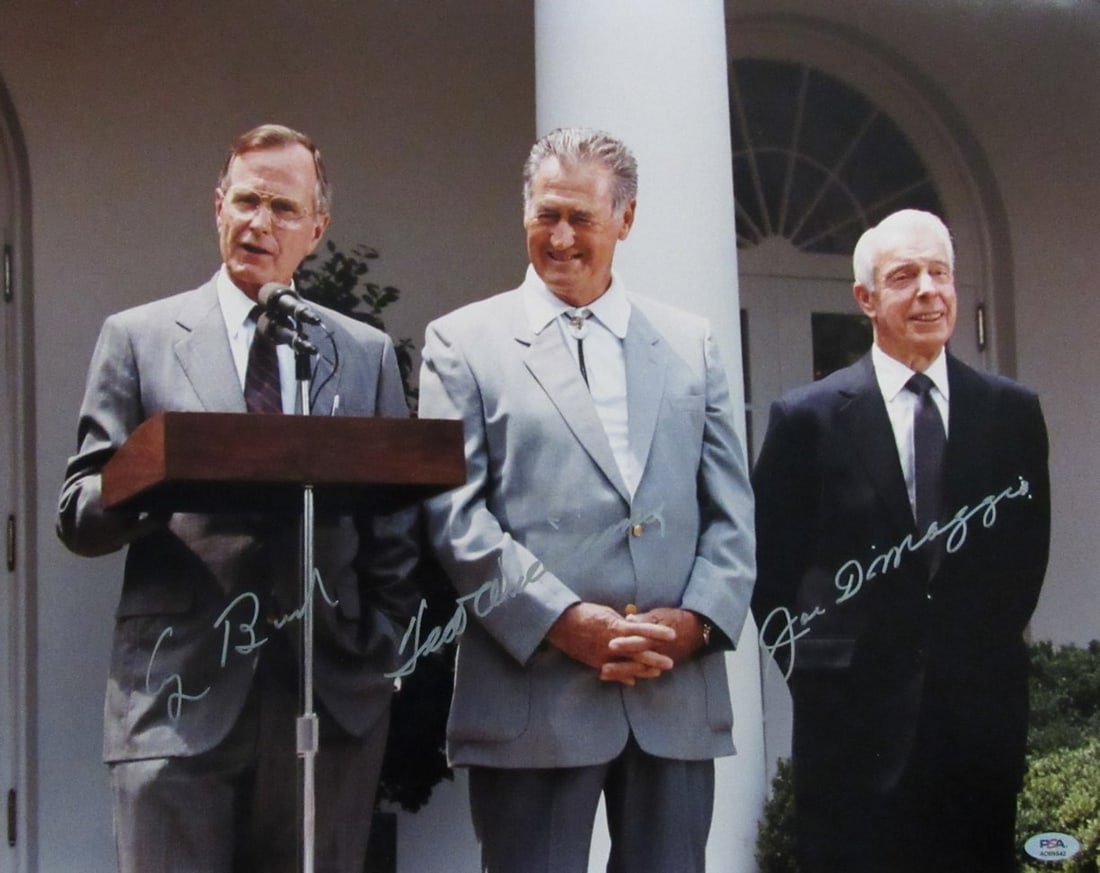 Williams DiMaggio Bush Multi-Signed 16x20 Photo PSA DNA 199543: Williams DiMaggio Bush Multi-Signed 16x20 Photo PSA DNA 199543 This remarkable multi-signed autographed 16x20 photo features baseball legends Ted Williams and Joe DiMaggio, along with President George