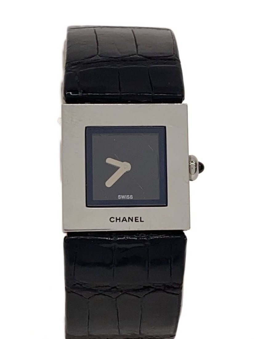 CHANEL Matelasse Leather Quartz Wristwatch for Women: CHANEL Matelasse Leather Quartz Wristwatch for Women This CHANEL Matelasse women's wristwatch features a Swiss-made quartz movement and a classic black leather band. The watch is in slightly used cond