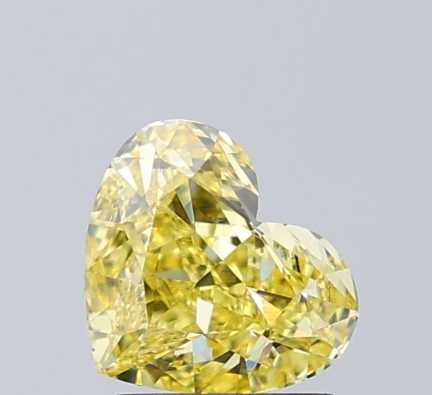 Loose Diamond - HEART 1.27ct Fancy Intense Yellow VS1: Loose Diamond - HEART 1.27ct Fancy Intense Yellow VS1 Source: This is a real non-mined Diamond that has been grown in a lab Shape: HEART Carats: 1.27 Color: Fancy Intense Yellow Certification: IGI Vid