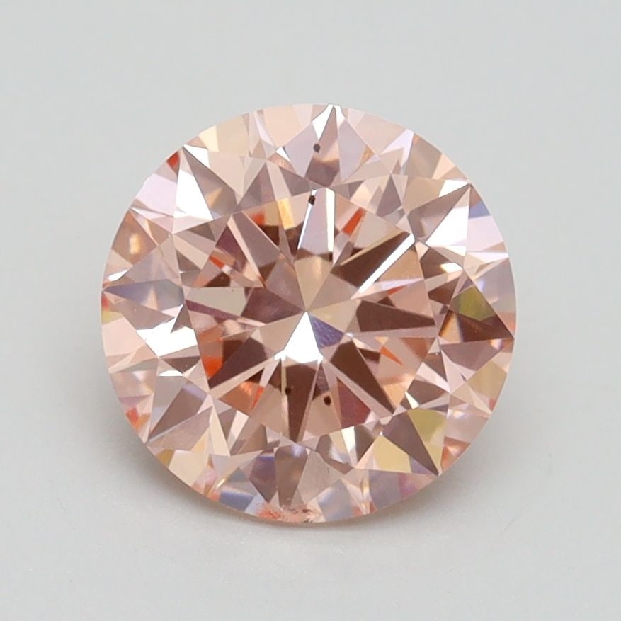 Loose Diamond - ROUND 1.87ct Fancy Intense Pink SI1: Loose Diamond - ROUND 1.87ct Fancy Intense Pink SI1 Source: This is a real non-mined Diamond that has been grown in a lab Shape: ROUND Carats: 1.87 Color: Fancy Intense Pink Certification: IGI Video: