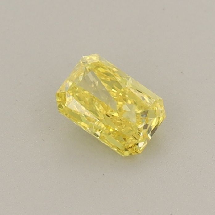 Loose Diamond - RADIANT 0.29ct Fancy Vivid Yellow VVS2: Loose Diamond - RADIANT 0.29ct Fancy Vivid Yellow VVS2 Source: This is a real non-mined Diamond that has been grown in a lab Shape: RADIANT Carats: 0.29 Color: Fancy Vivid Yellow Certification: IGI Ad