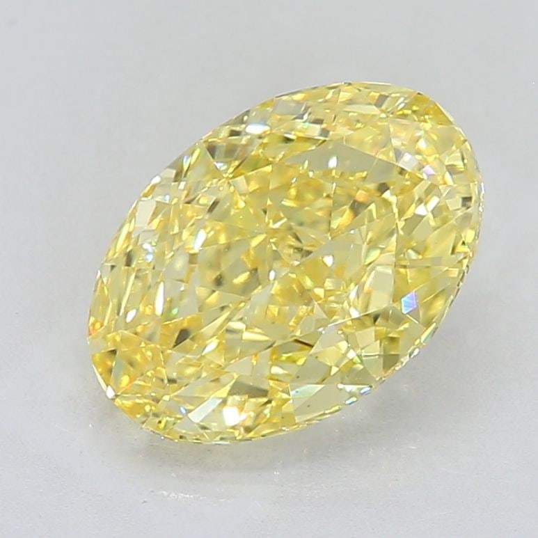 Loose Diamond - OVAL 5.01ct Fancy Vivid Yellow VVS2: Loose Diamond - OVAL 5.01ct Fancy Vivid Yellow VVS2 Source: This is a real non-mined Diamond that has been grown in a lab Shape: OVAL Carats: 5.01 Color: Fancy Vivid Yellow Certification: IGI Video: