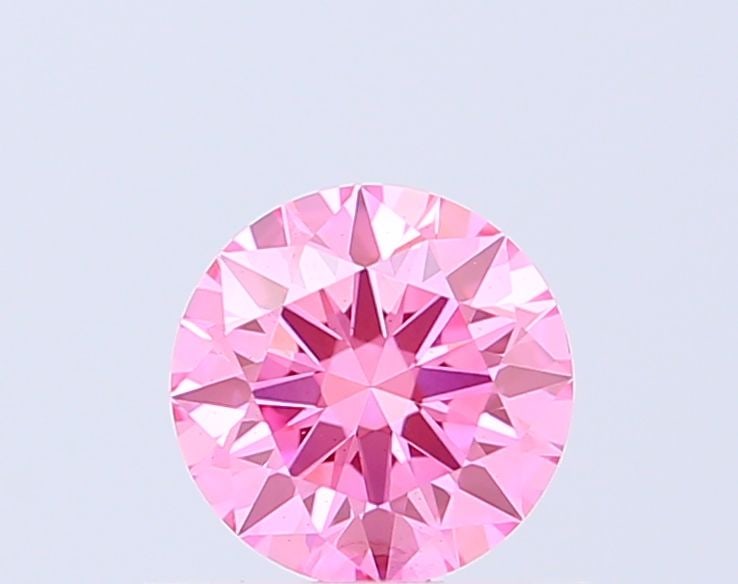 Ideal Loose Diamond - ROUND 0.6ct Fancy Vivid Pink VS2: Ideal Loose Diamond - ROUND 0.6ct Fancy Vivid Pink VS2 Source: This is a real non-mined Diamond that has been grown in a lab Shape: ROUND Carats: 0.6 Color: Fancy Vivid Pink Certification: IGI Video: