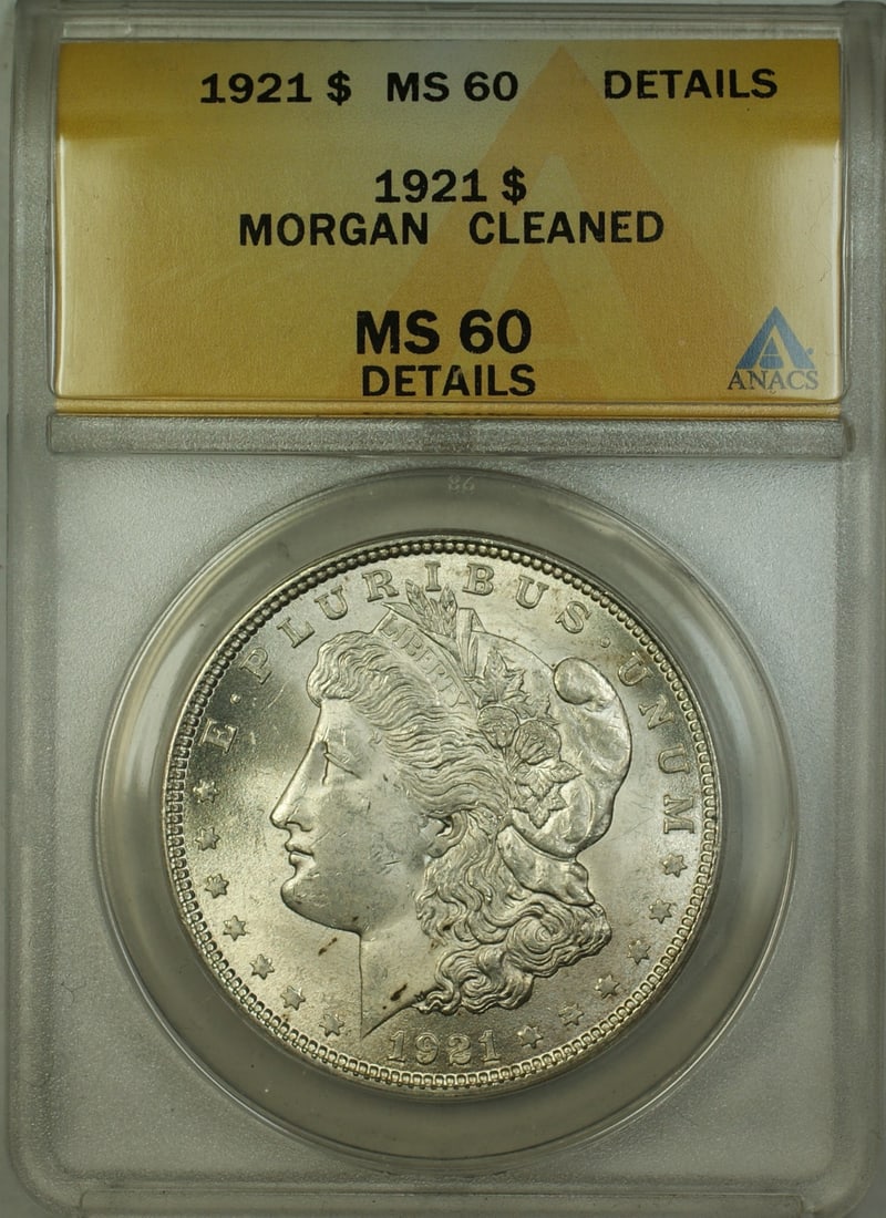 ANACS MS 60 Details 1921 Morgan Dollar Cleaned: ANACS MS 60 Details 1921 Morgan Dollar Cleaned This is a 1921 Morgan Silver Dollar from the United States, minted in Philadelphia. The coin has been graded MS 60 Details by ANACS and is certified as u